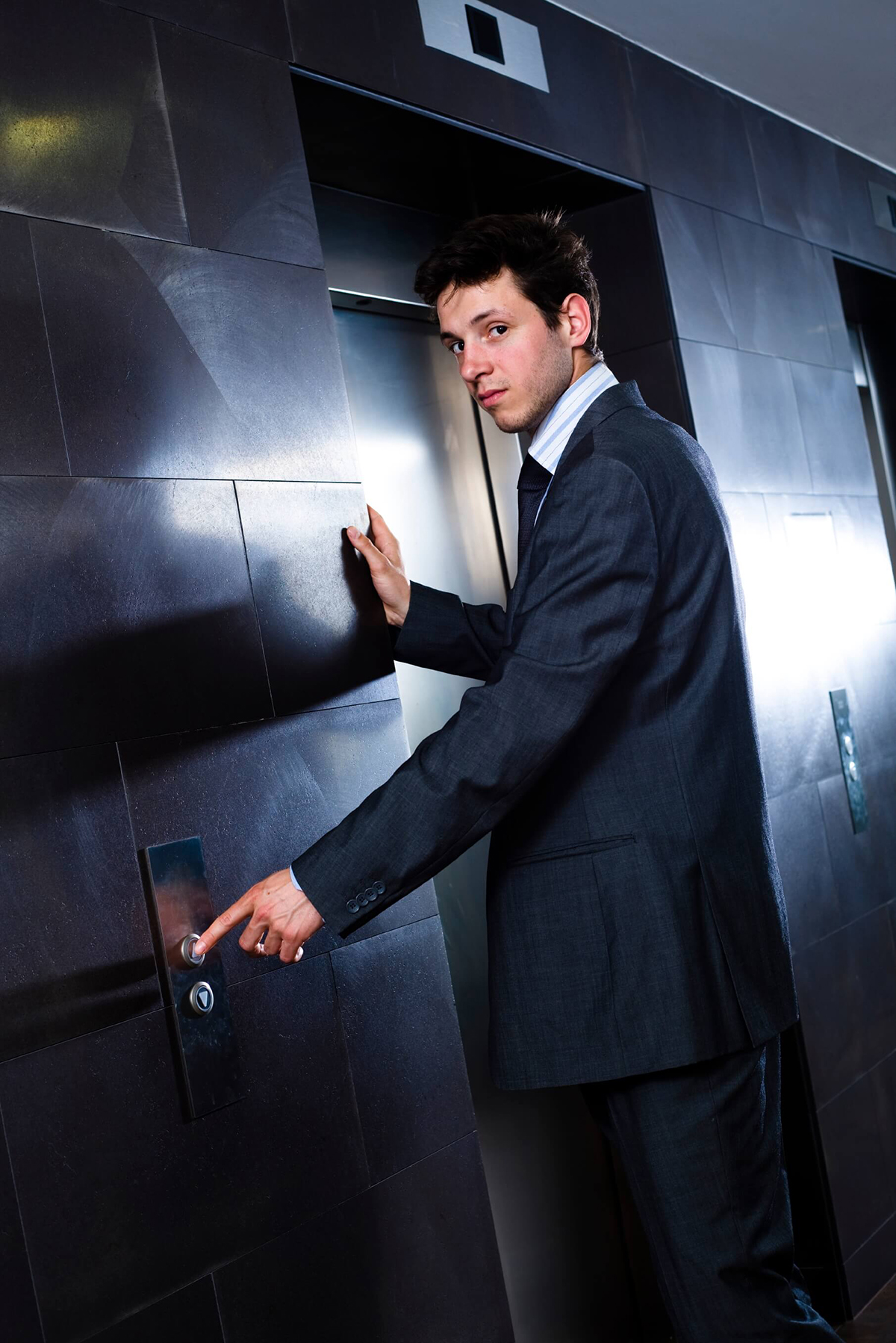 businessman in front of elevator